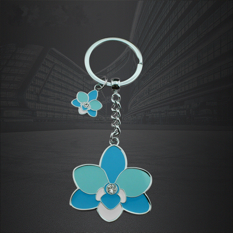 ผู้ผลิตผู้จัดจำหน่ายเฉพาะรูปทรงดอกไม้สังกะสีรูปตัว Epoxy Key Chains พวงกุญแจ