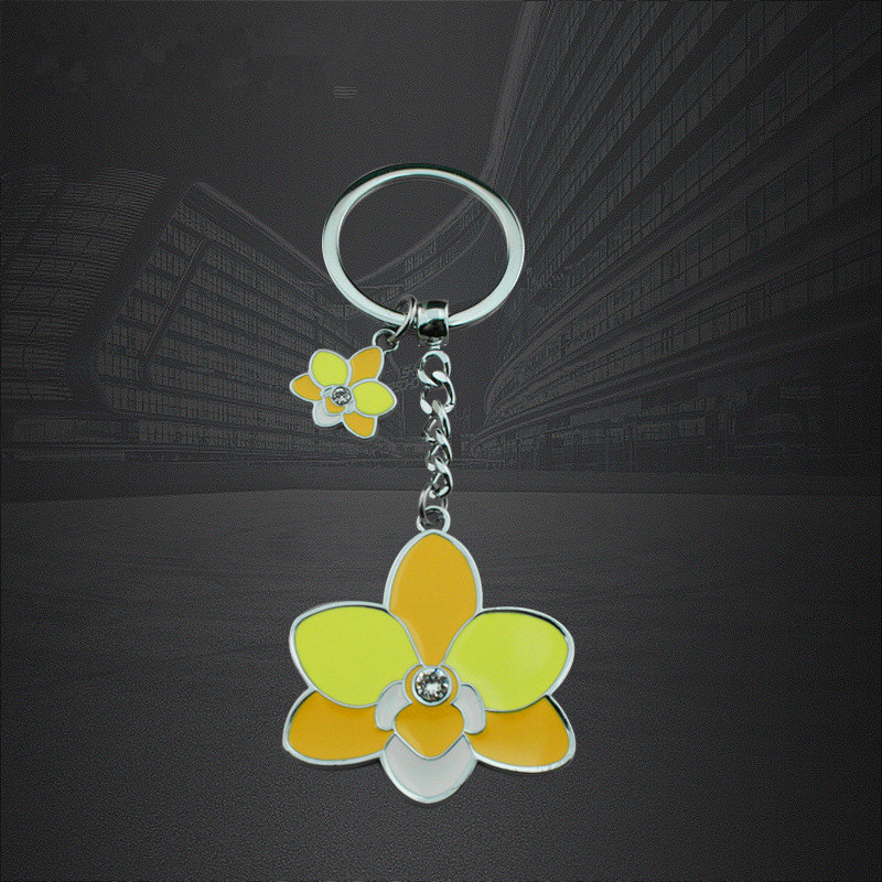 ผู้ผลิตผู้จัดจำหน่ายเฉพาะรูปทรงดอกไม้สังกะสีรูปตัว Epoxy Key Chains พวงกุญแจ