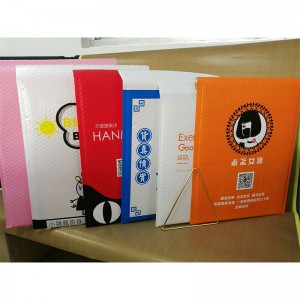 50 โรงงานขายส่งที่กำหนดเองพิมพ์สีชมพูสีพลาสติกฟองถุงจดหมายซองจดหมายเบาะ / โลหะ