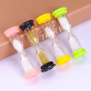 เด็กมีความสุขเวลา 5 นาทีพลาสติกขนาดเล็กหนึ่งนาทีแก้วนาทีตัวจับเวลาทราย