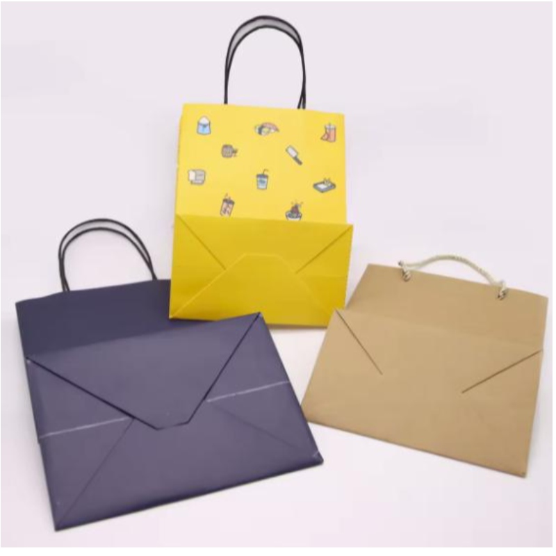 โลโก้ที่พิมพ์ออกมาโลโก้ Kraft Paper บรรจุภัณฑ์กระเป๋าของขวัญงานฝีมือการช็อปปิ้งถุงกระดาษย่อยสลายได้ด้วยมือจับ